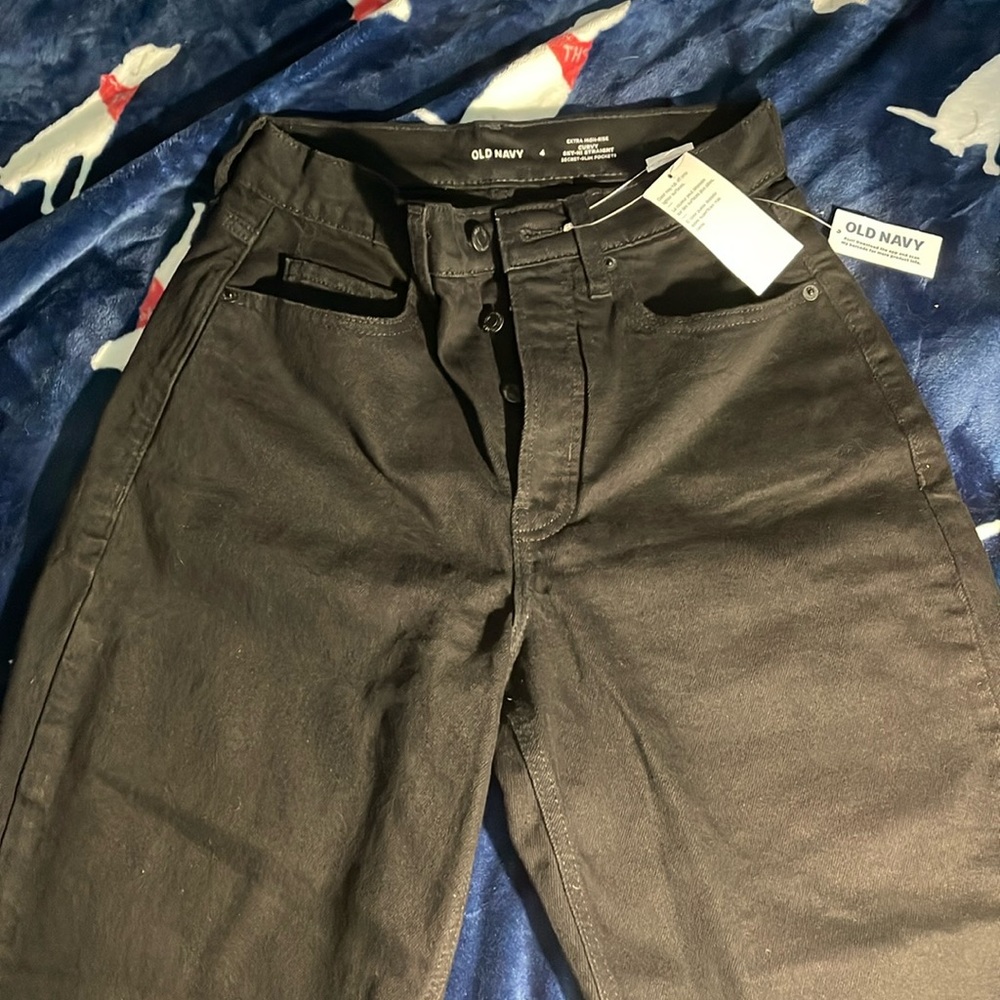 Black button fly jeans